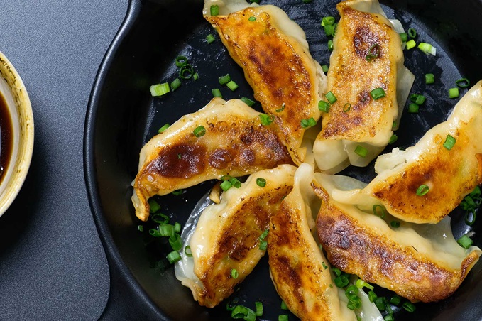 fried japanese gyoza dumplings with soy sauce