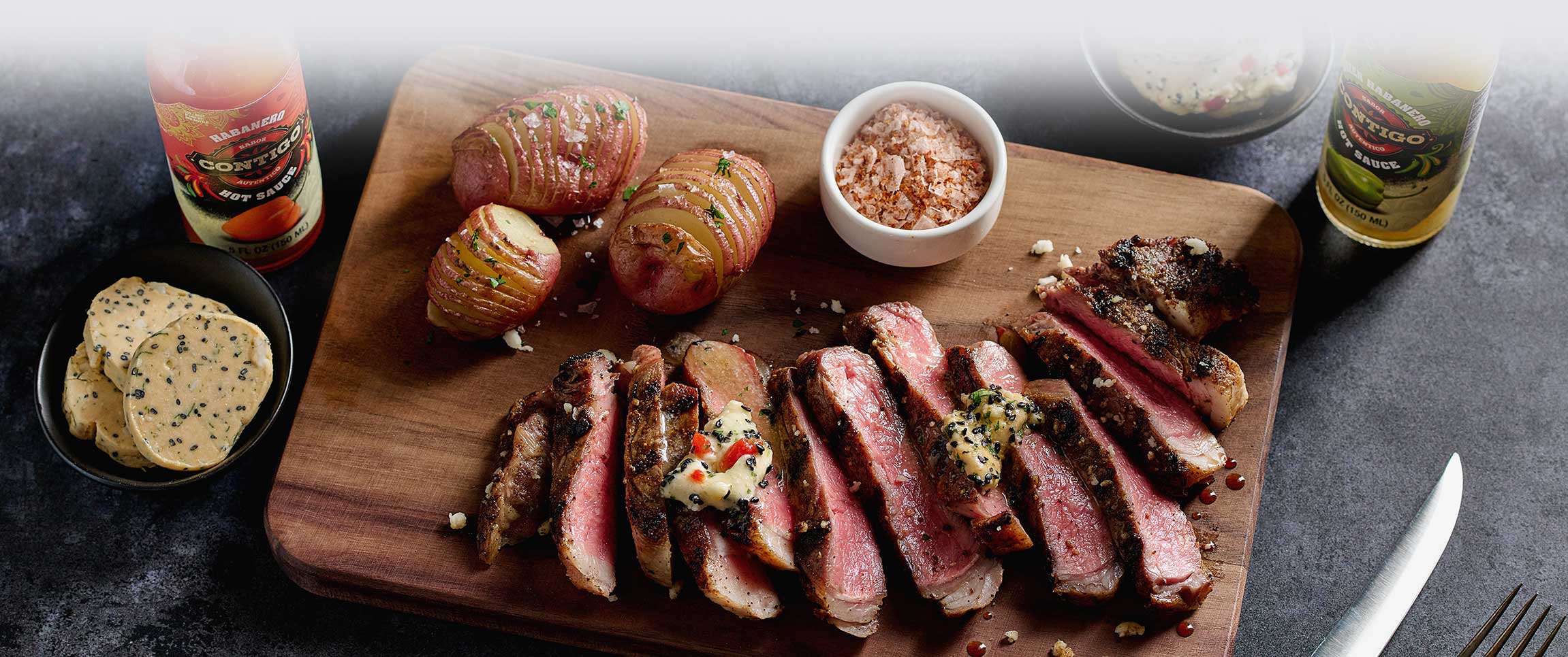 Braveheart® Chili Crusted Strip Loin with Dueling Contigo® Habanero Butters