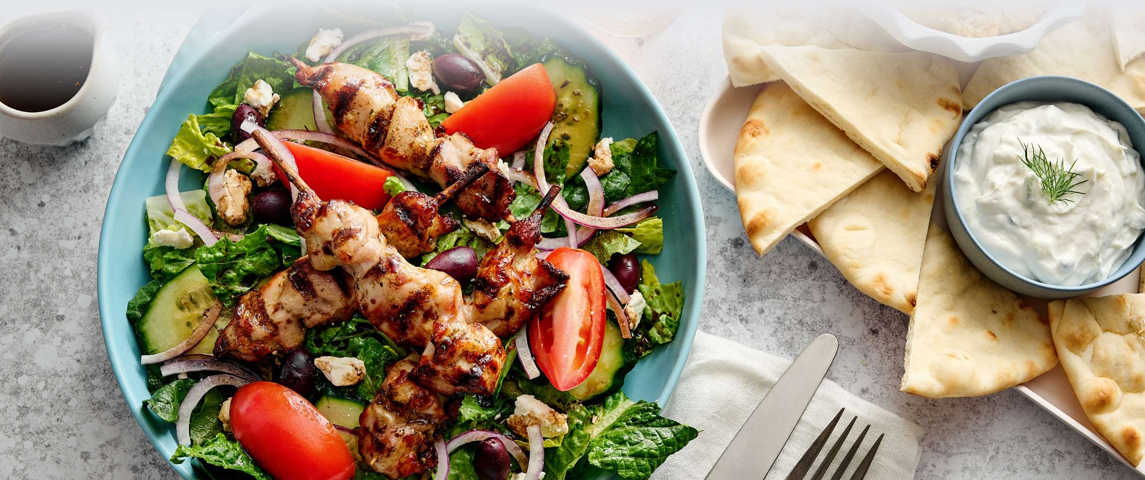 Mediterranean Salad with Chicken Skewers