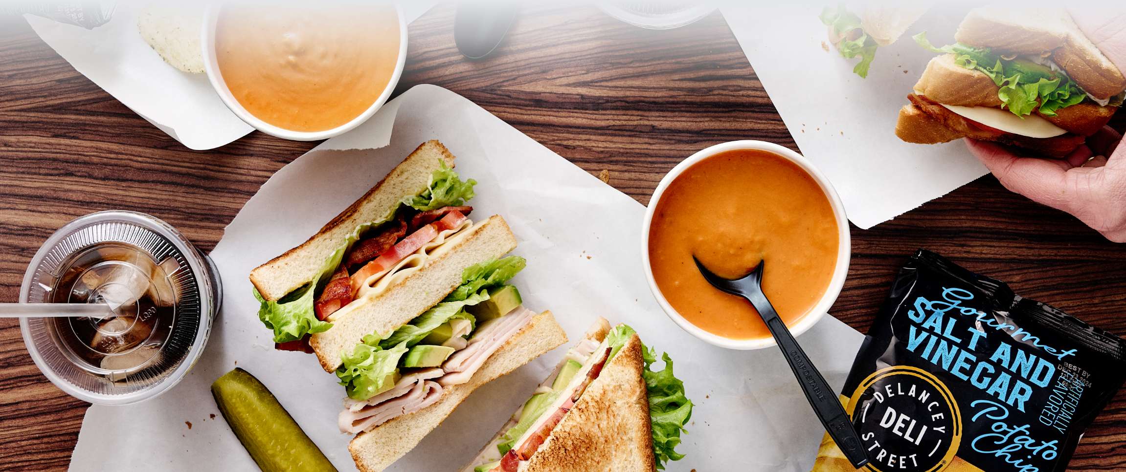 Texas-Style Smoked Turkey Club with Tomato Bisque and Chips