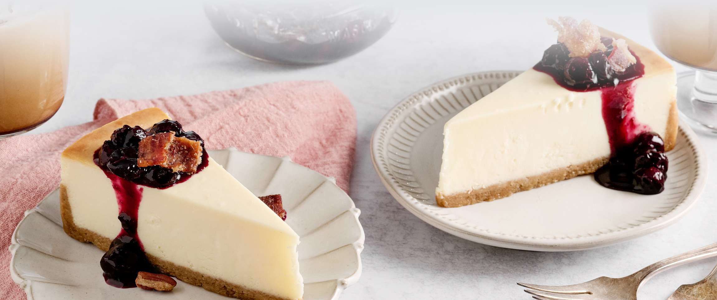 Blueberry Compote with Bacon Crumble over a slice of cheescake