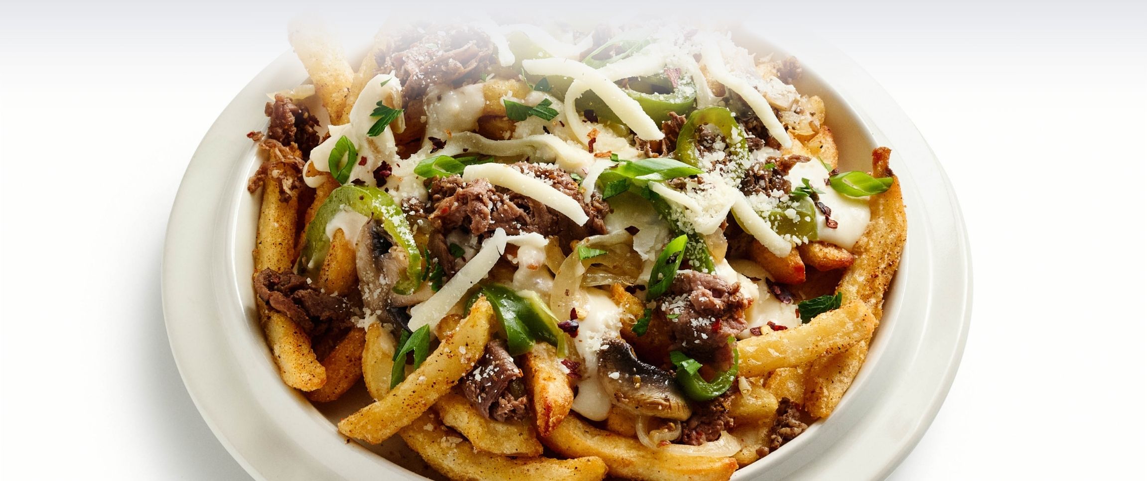 Garlic Alfredo Cheesesteak Loaded Fries