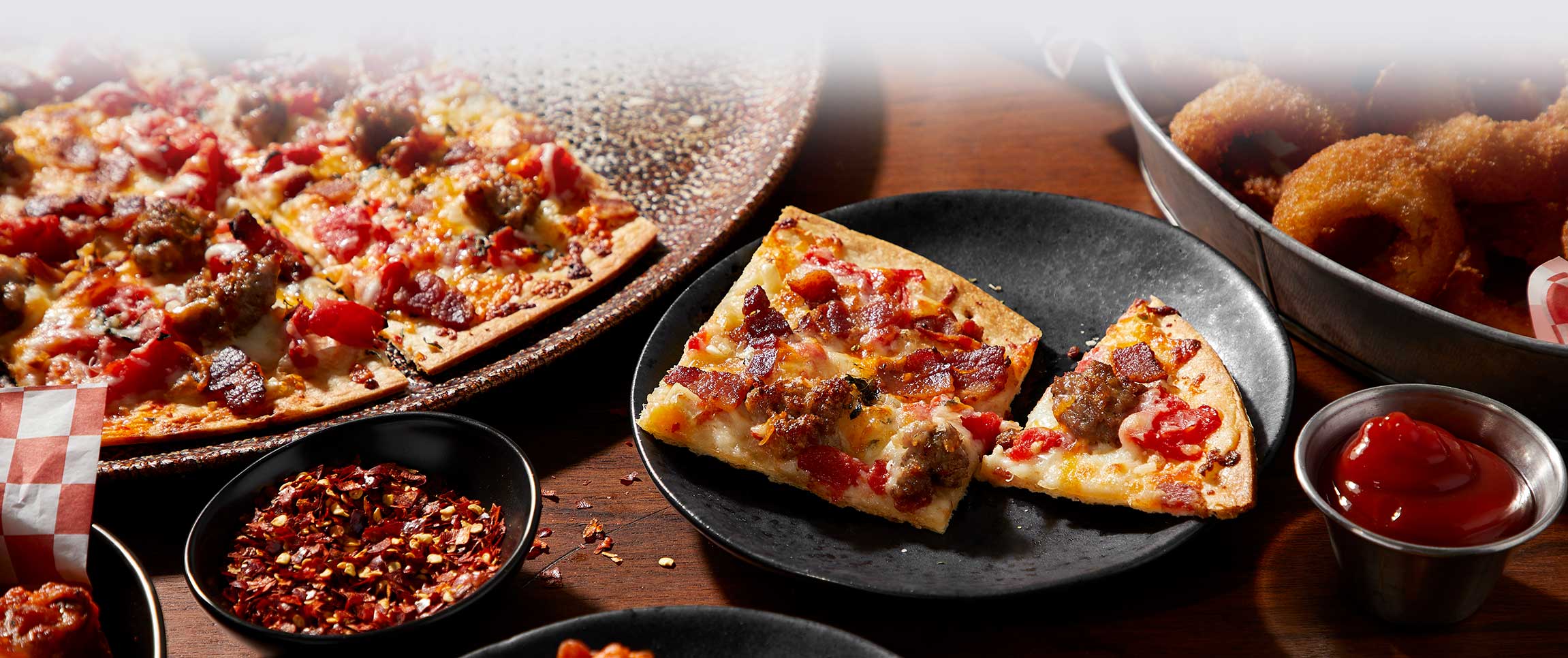 Sausage, Bacon, and Cheddar Pizza