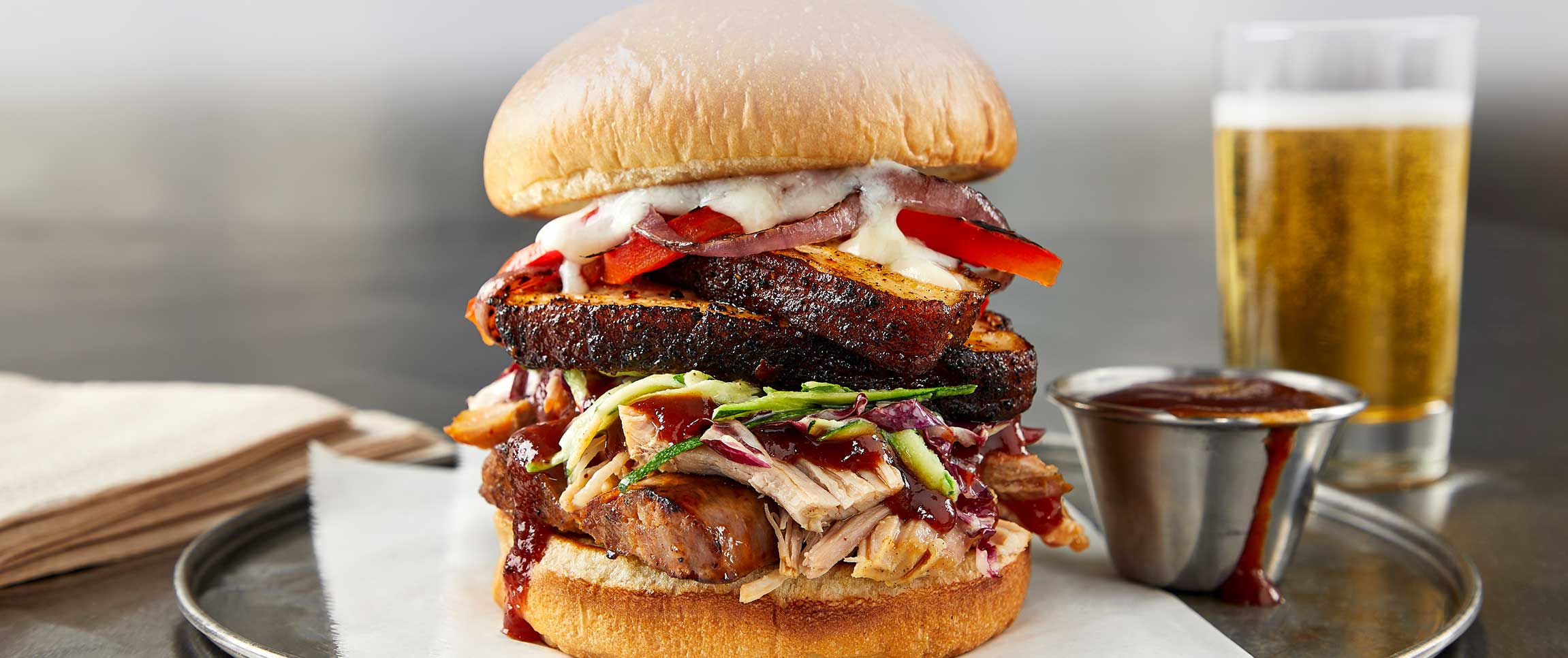 Beer Belly Sandwich Served with a Cold Beer