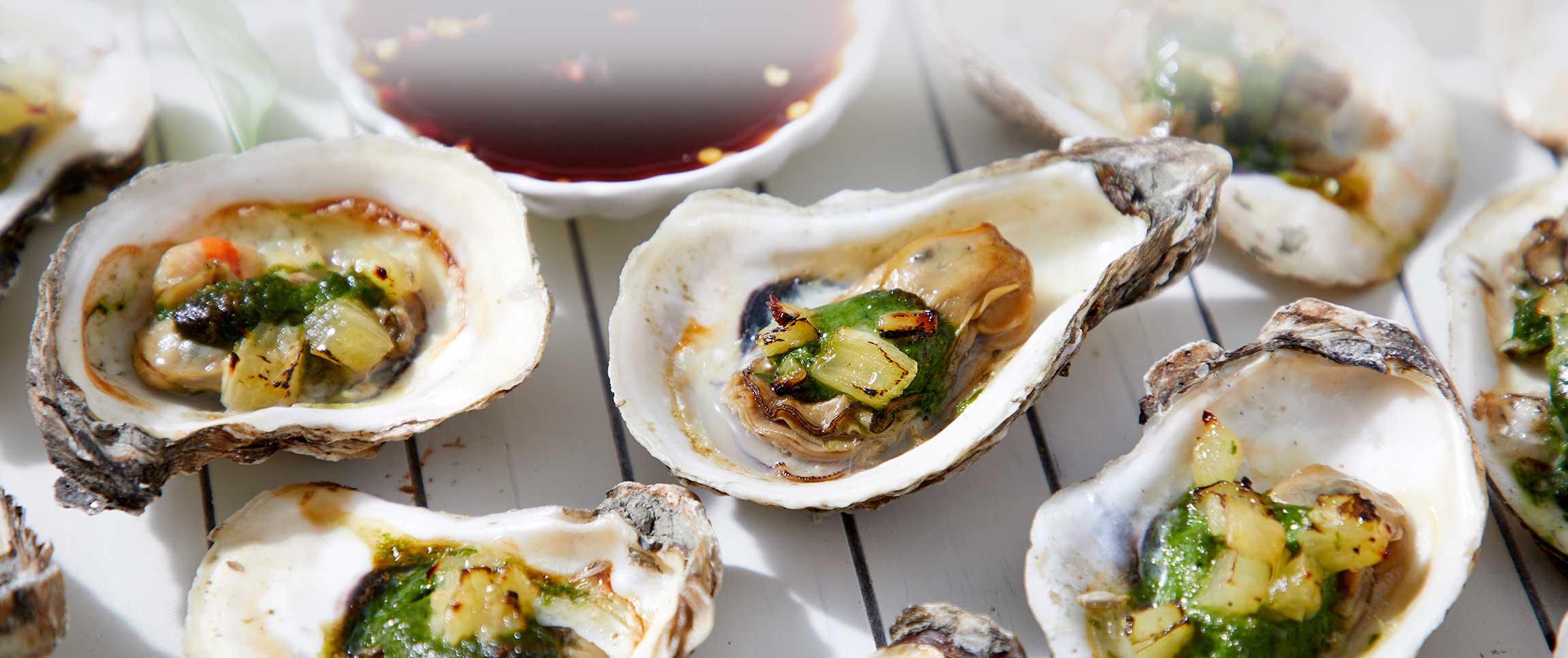 Grilled Oysters with Thai Basil Pesto and Grilled Pineapple