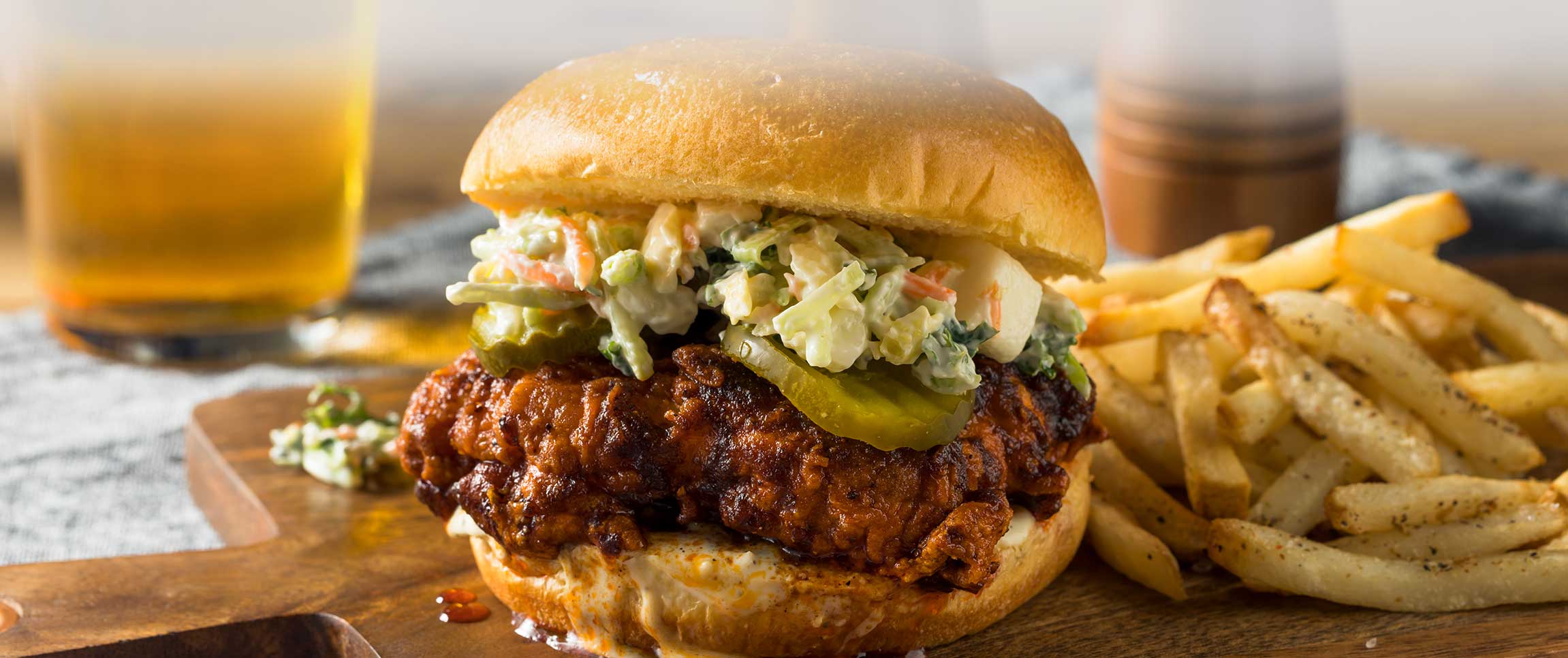 Nashville Hot Chicken Sandwich with Fries and Beer