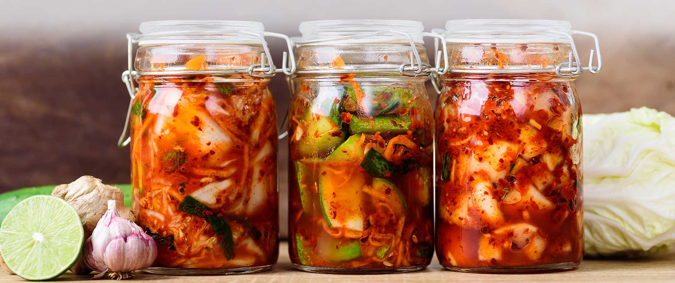 Kimchi cabbage, cucumber and radish in jars