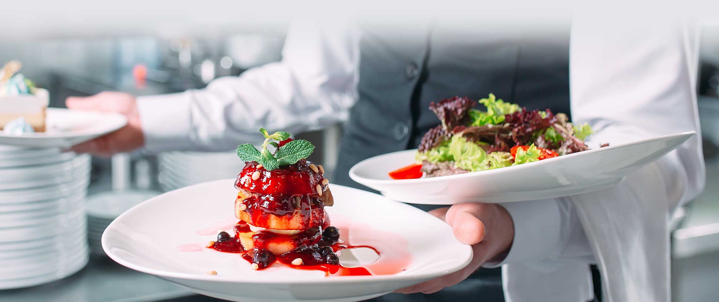 Waiter serving in motion on duty in restaurant