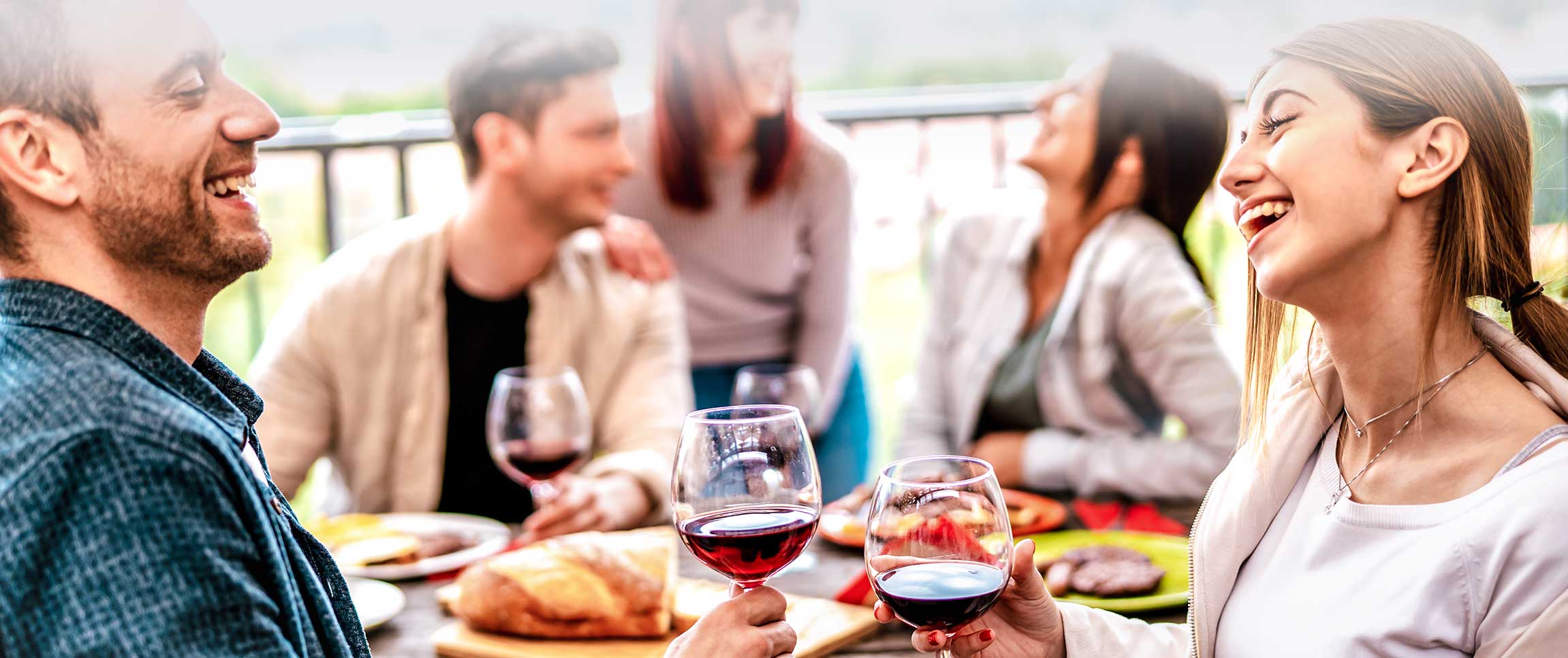 People enjoying dinner outdoors