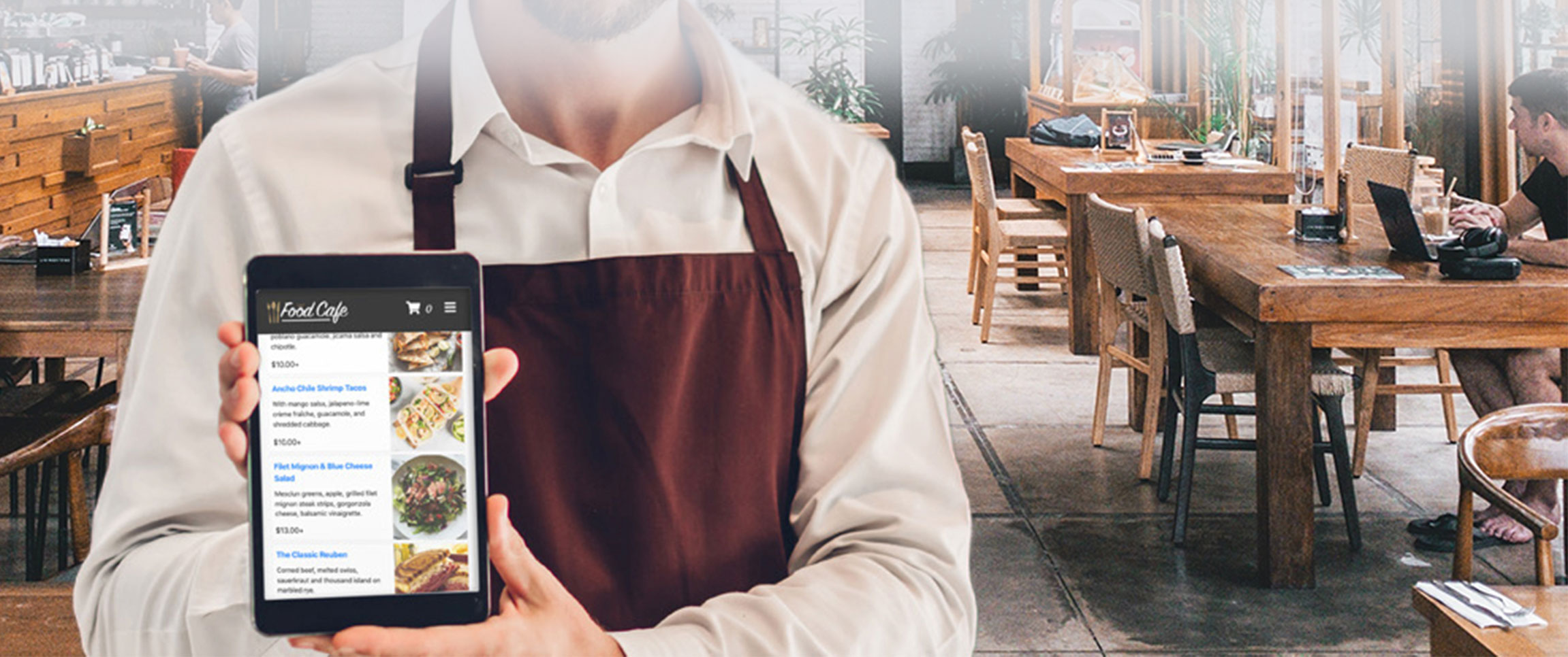 Man holding Menufy tablet