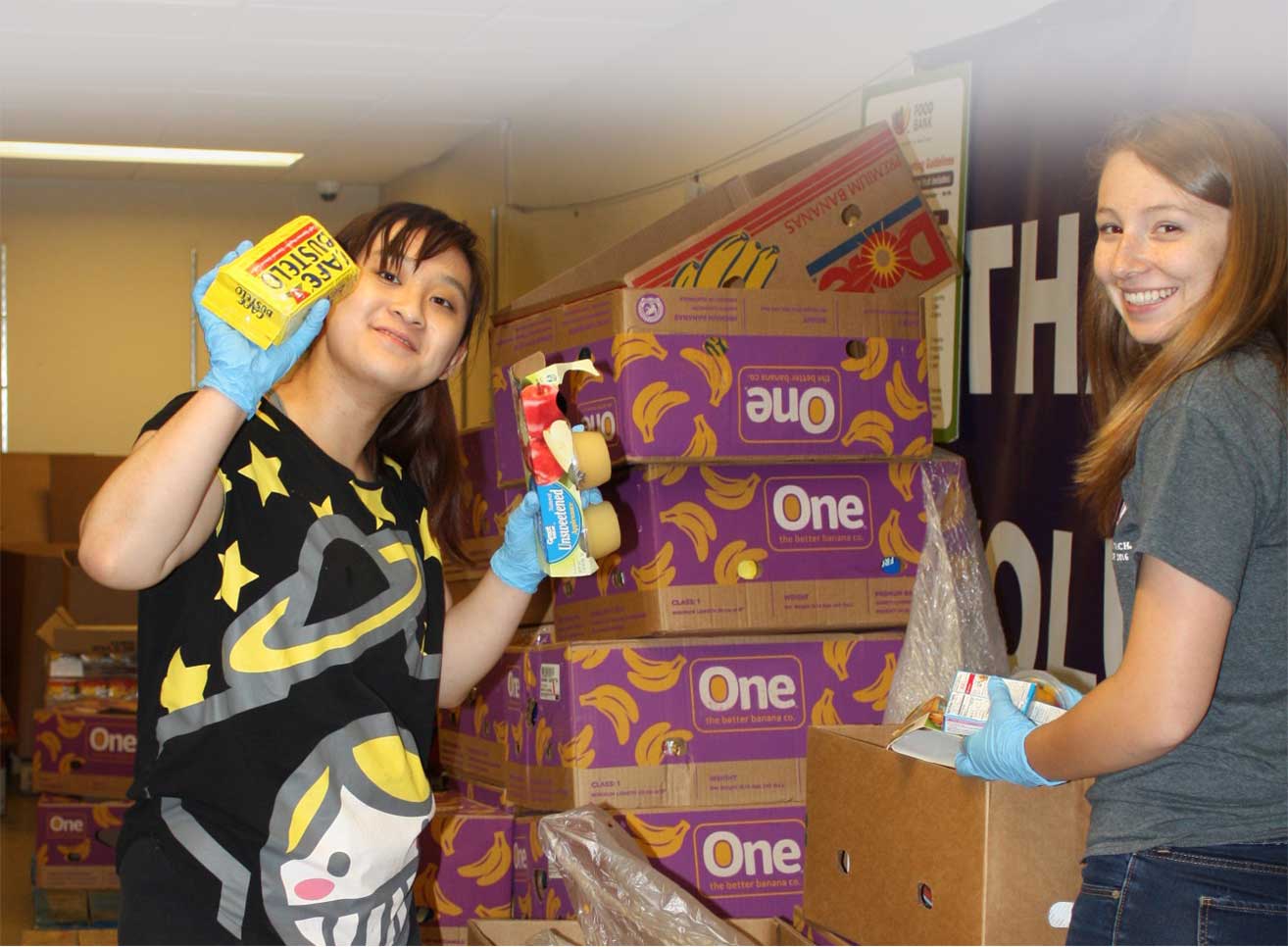 Volunteers helping with product distribution