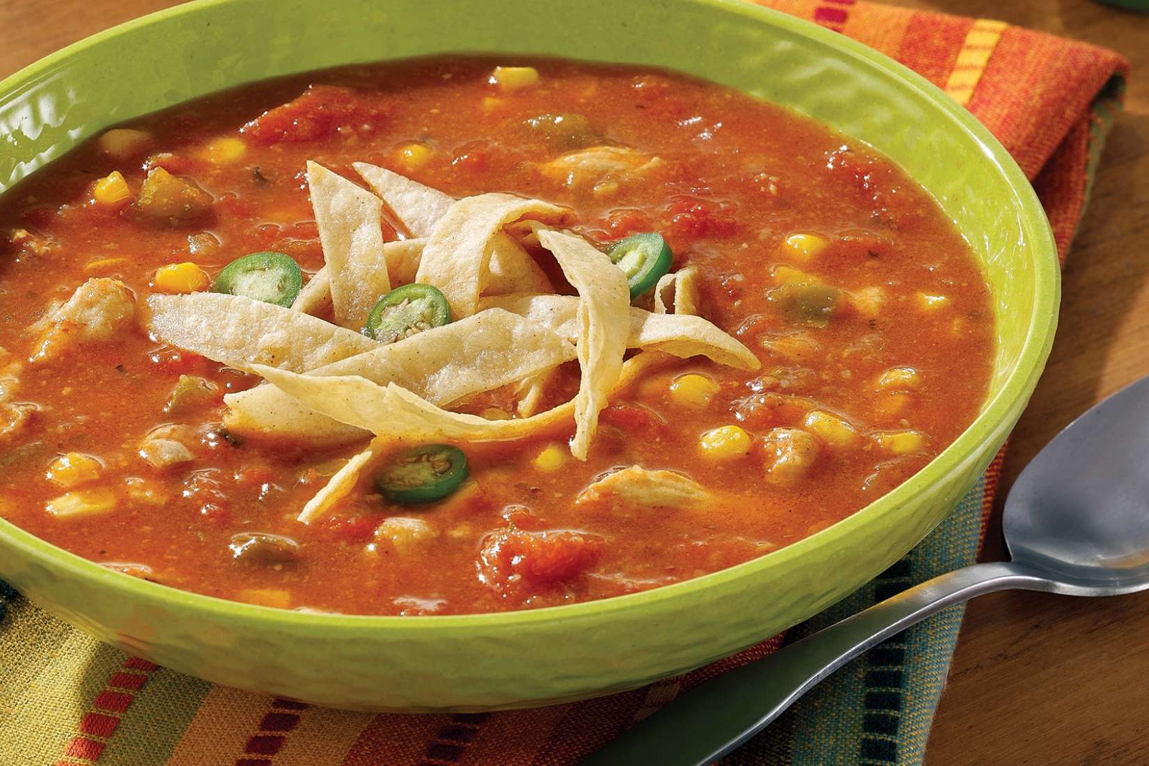 Chicken Tortilla soup in a green bowl