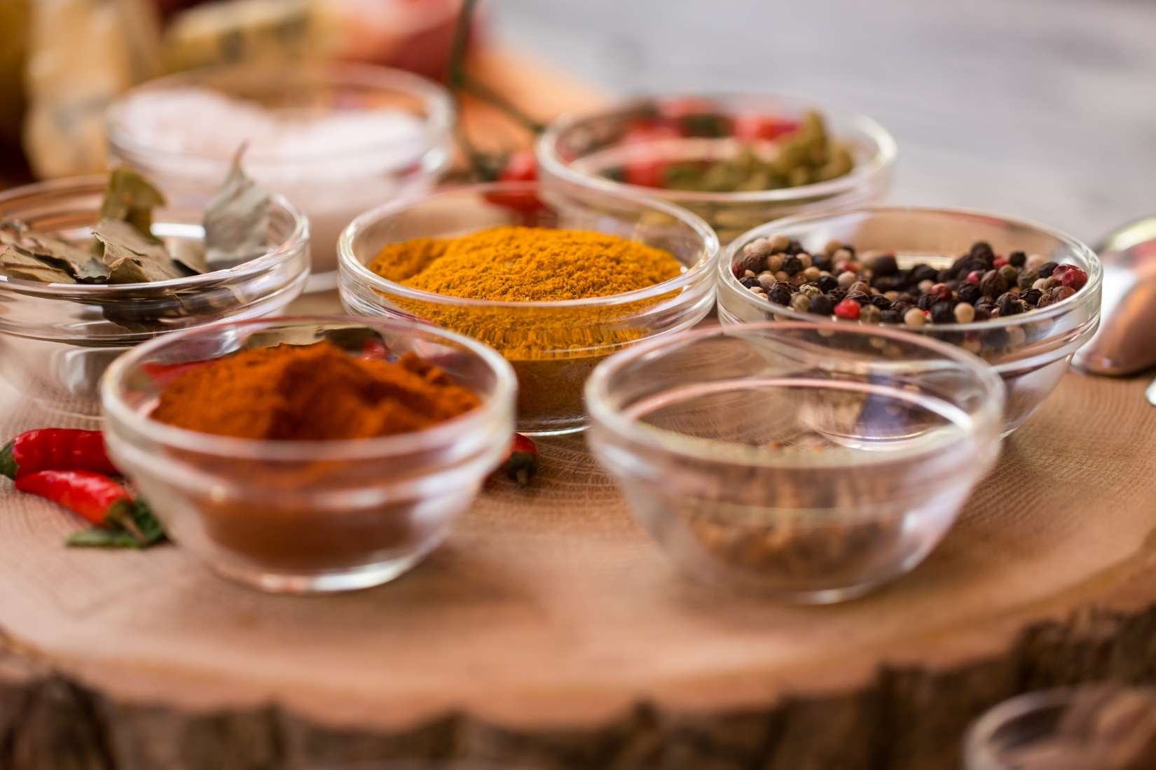 Variety of spices in small glass bowls