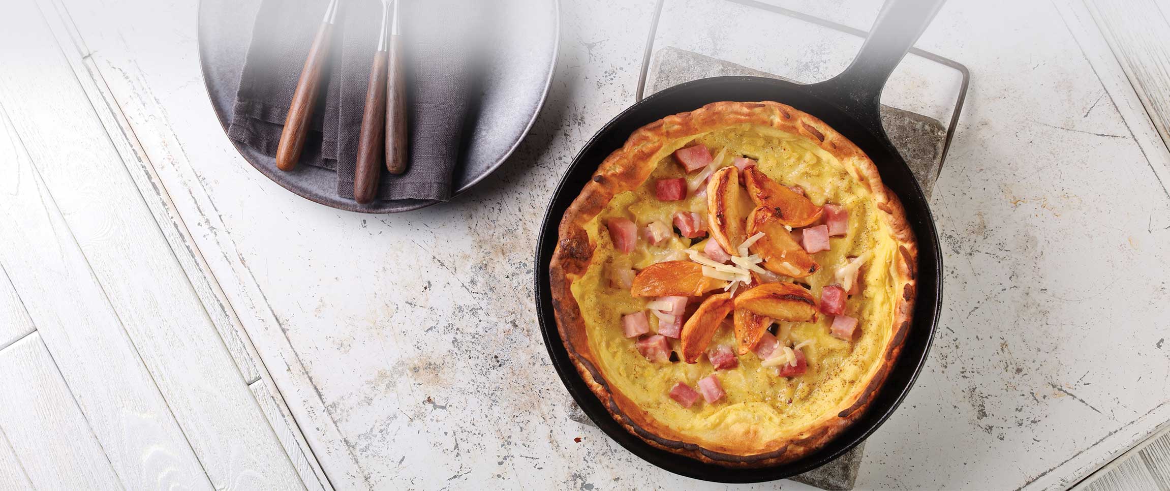 Ham, Aged Cheddar and Roasted Apple Dutch Baby