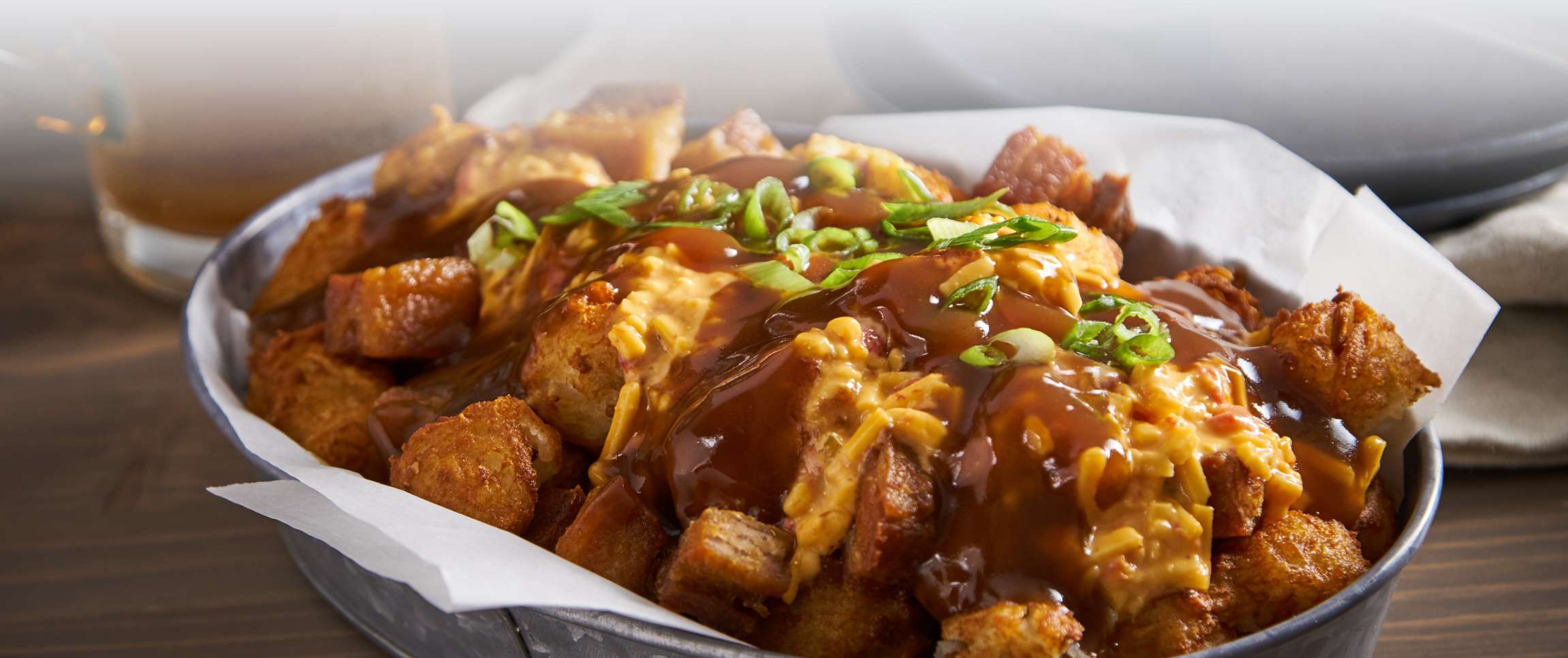 Smothered Pork Belly Tots