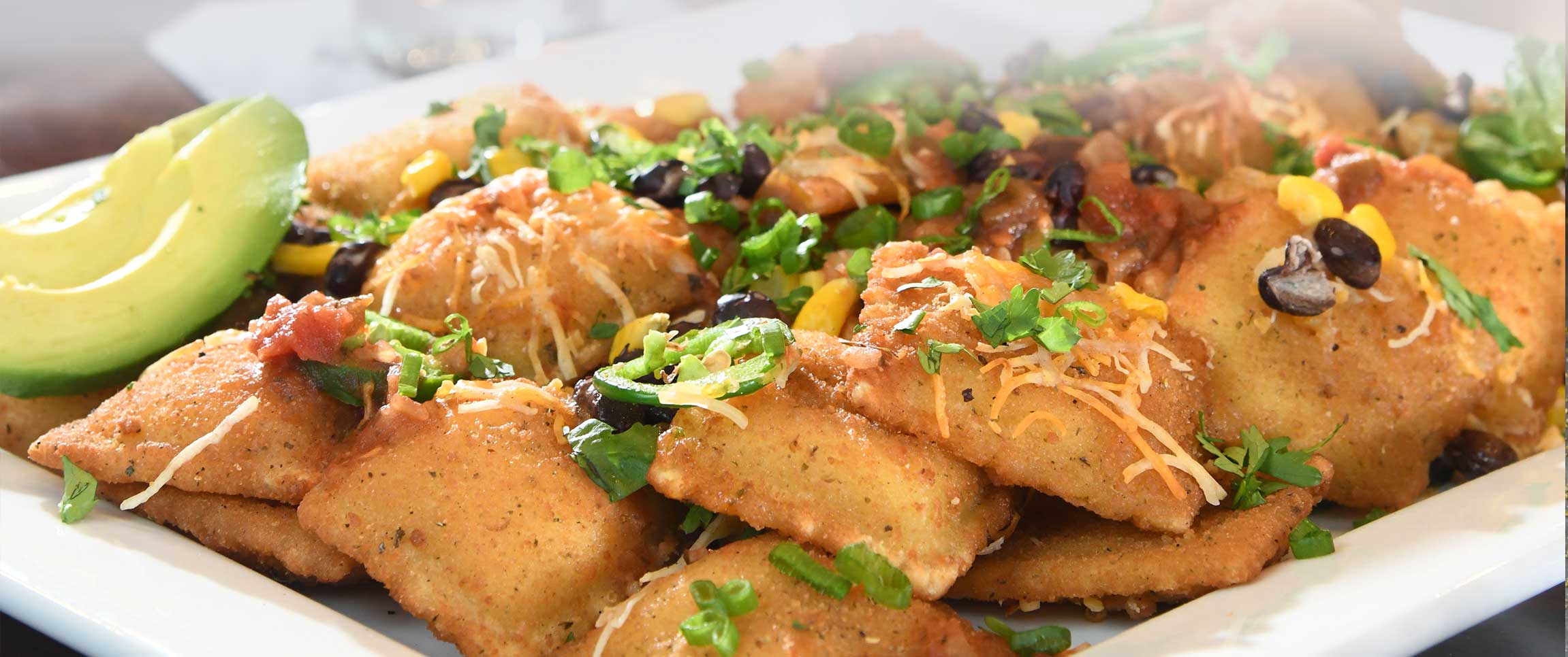 Toasted Four Cheese Ravioli Nachos