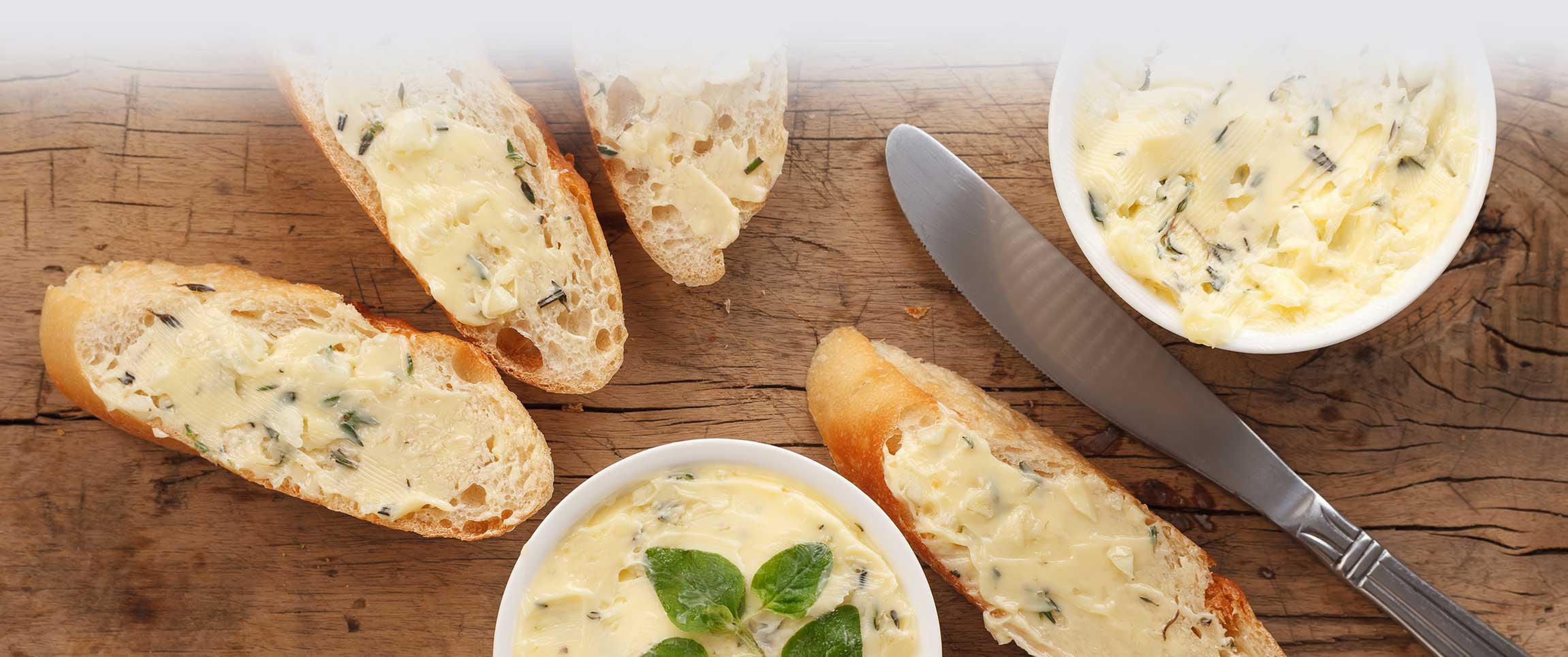 Compound butter spread on bread pieces