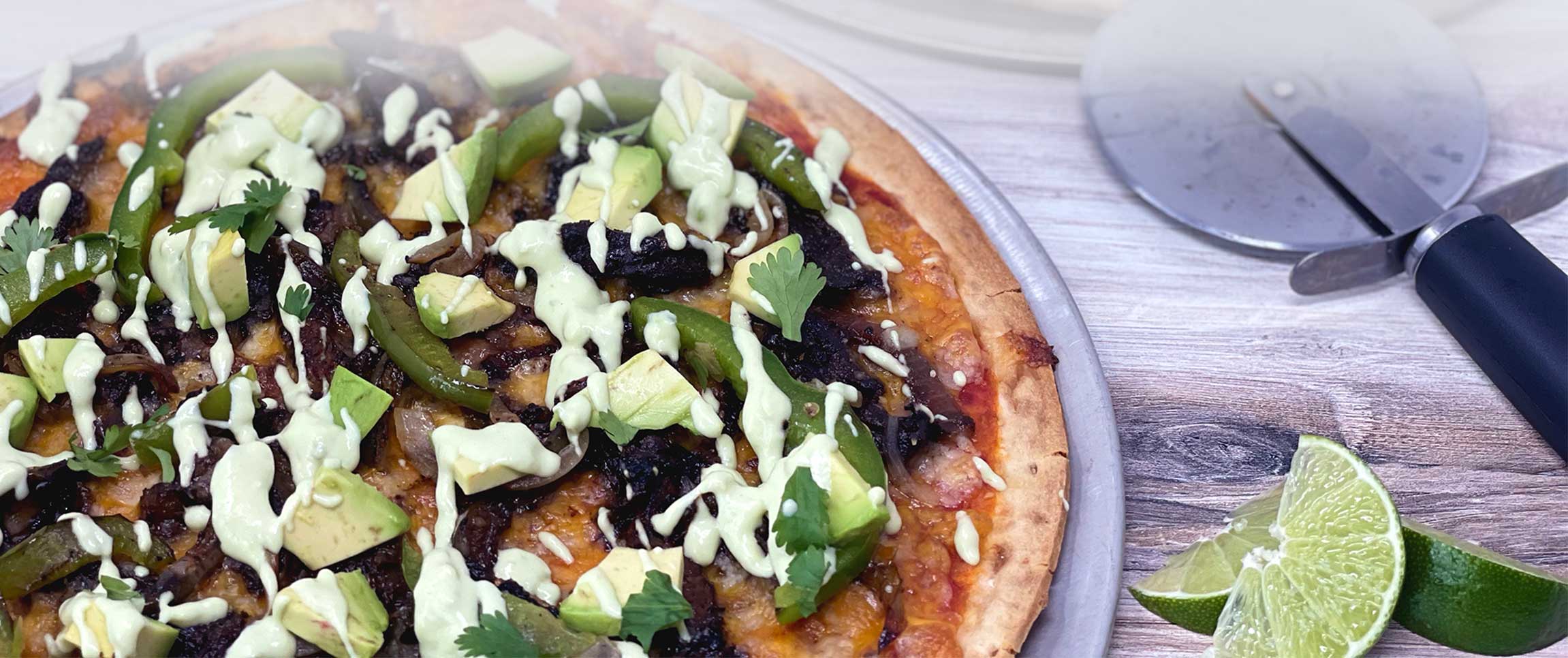 Avocado Fajita Pizza Drizzled with Lime Crema