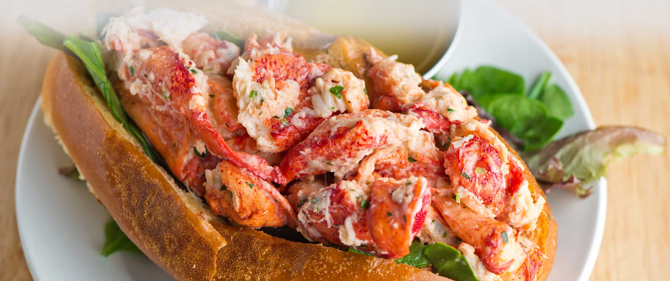 Open Face Lobster Roll with a Side of Melted Butter