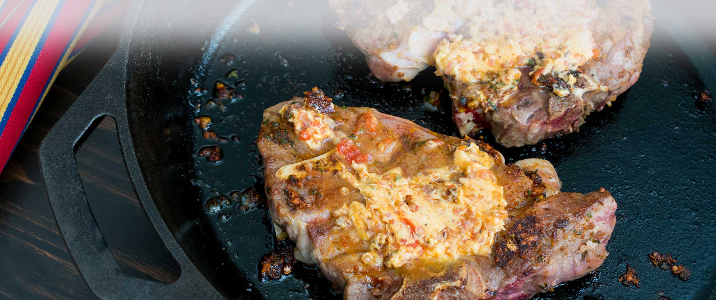 Sun-Dried Tomato Compound Butter Atop Lamb Shoulder Chops