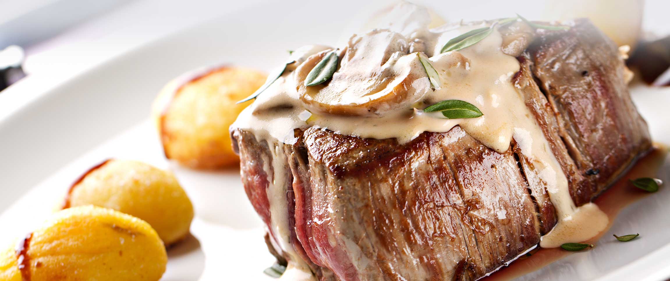 Veal Topped with a Forest Mushroom Glace