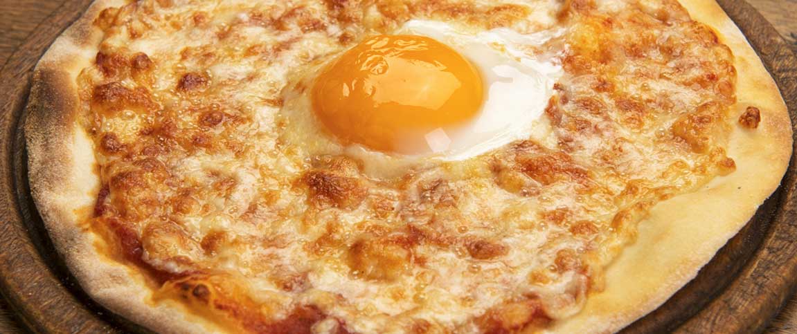 Pizza Topped with Over Easy Egg