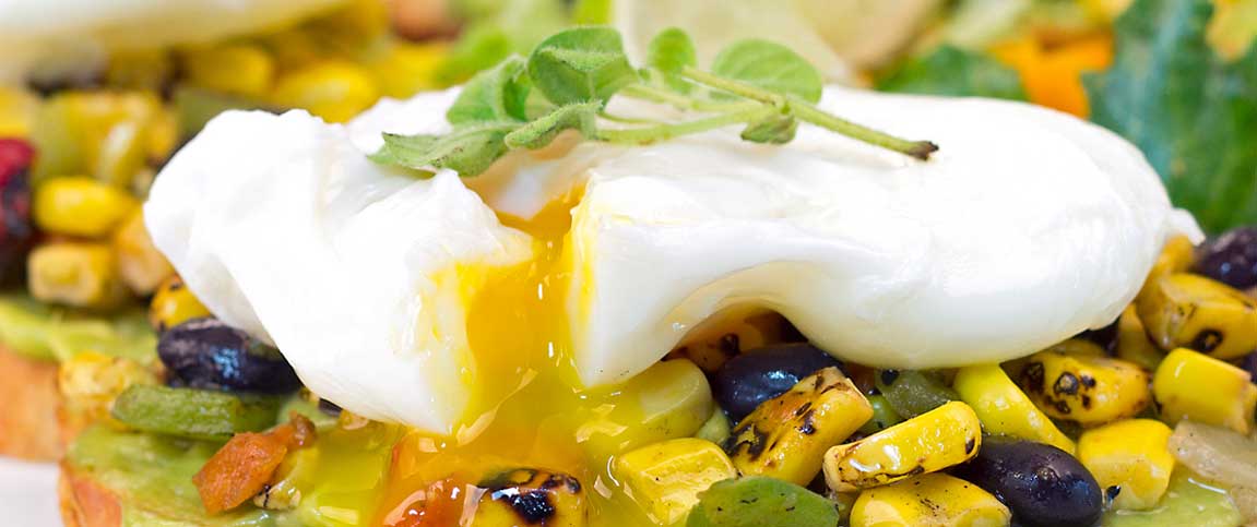 Bread Topped with Corn Salsa and Poached Egg