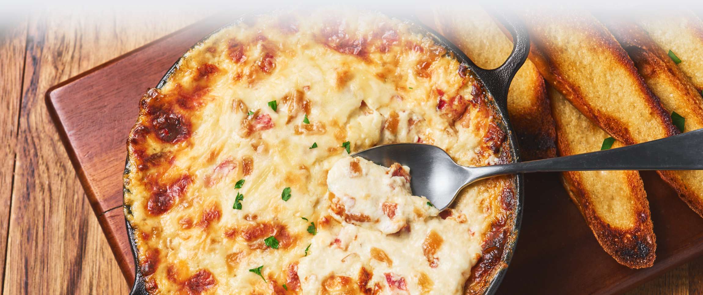 Hot Caramelized Onion Dip with Bacon and Gruyere