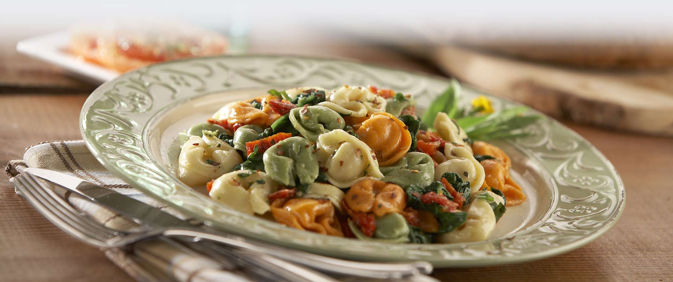 Tri-Color Cheese Tortellini Caprese Salad with Oil and Herb Dressing