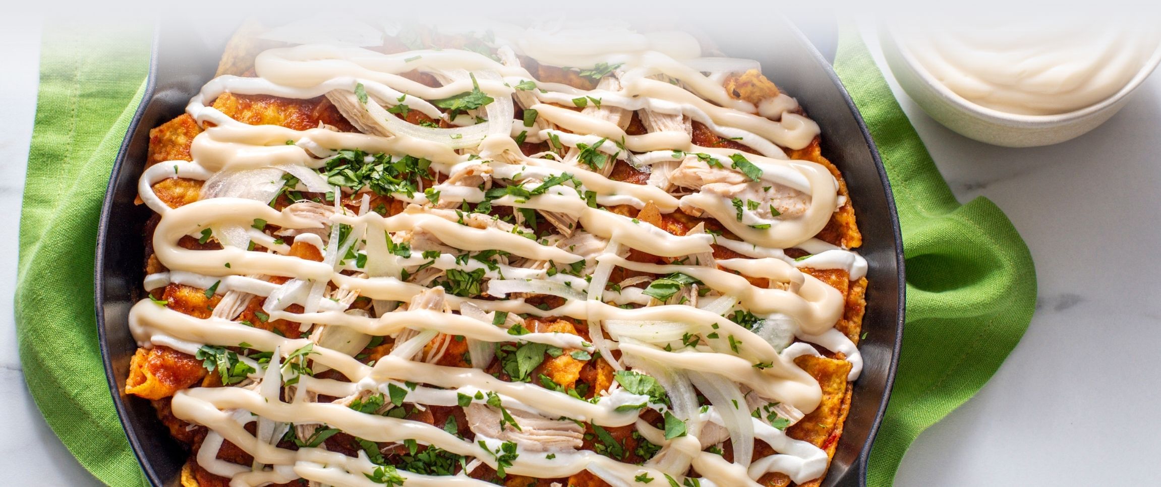 Chipotle Chilaquiles with Monterey Jack Cheese Sauce