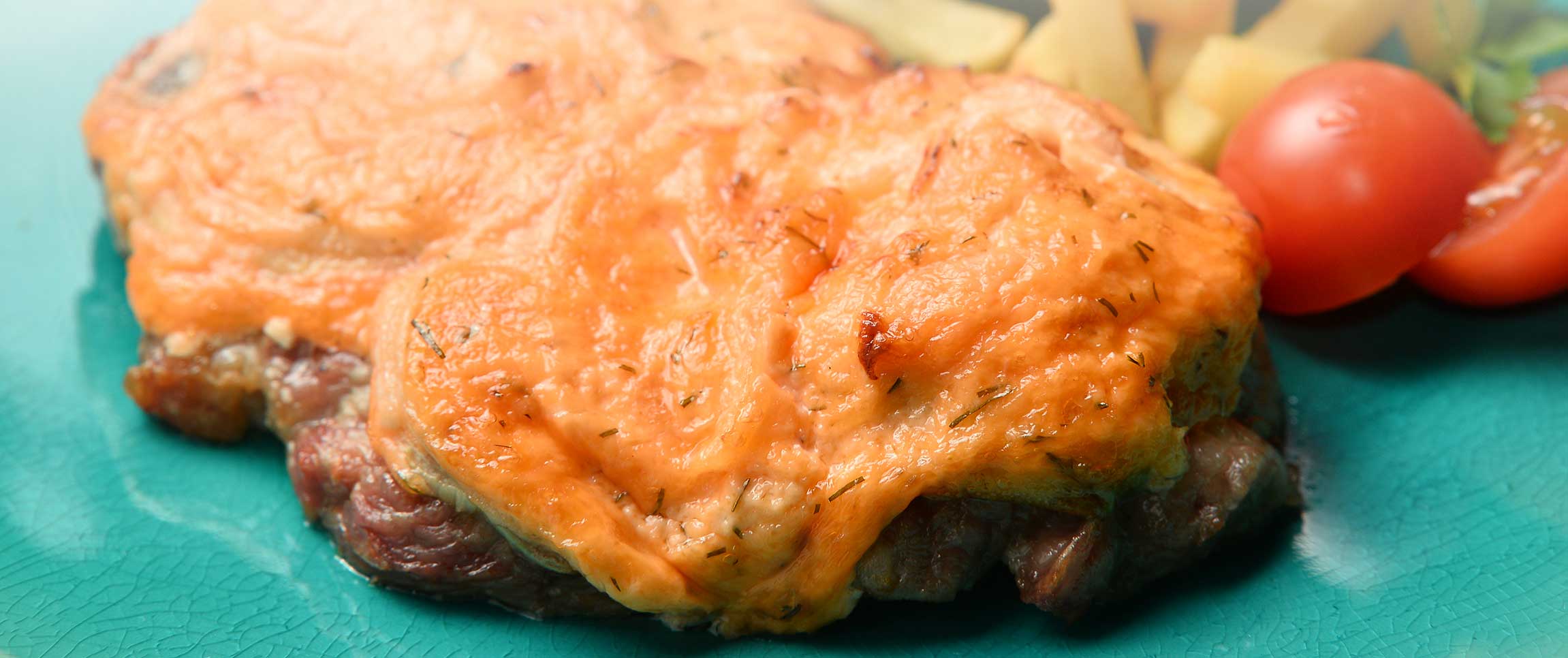 Crusted Veal Topped with Beer Cheese