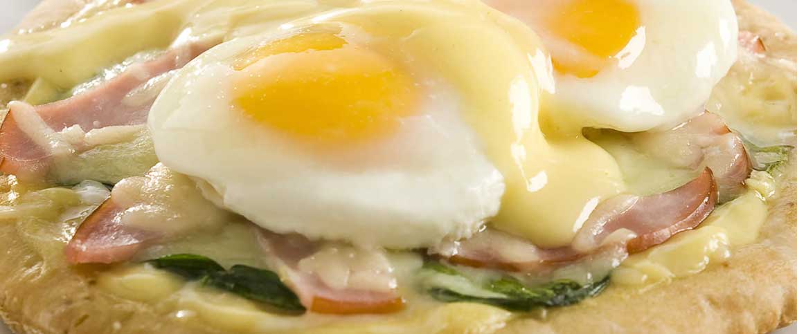 Pizza Topped with Eggs Florentine