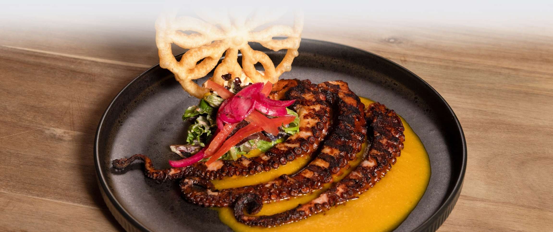 Grilled Octopus Salad with Roasted Garlic Chipotle Dresing