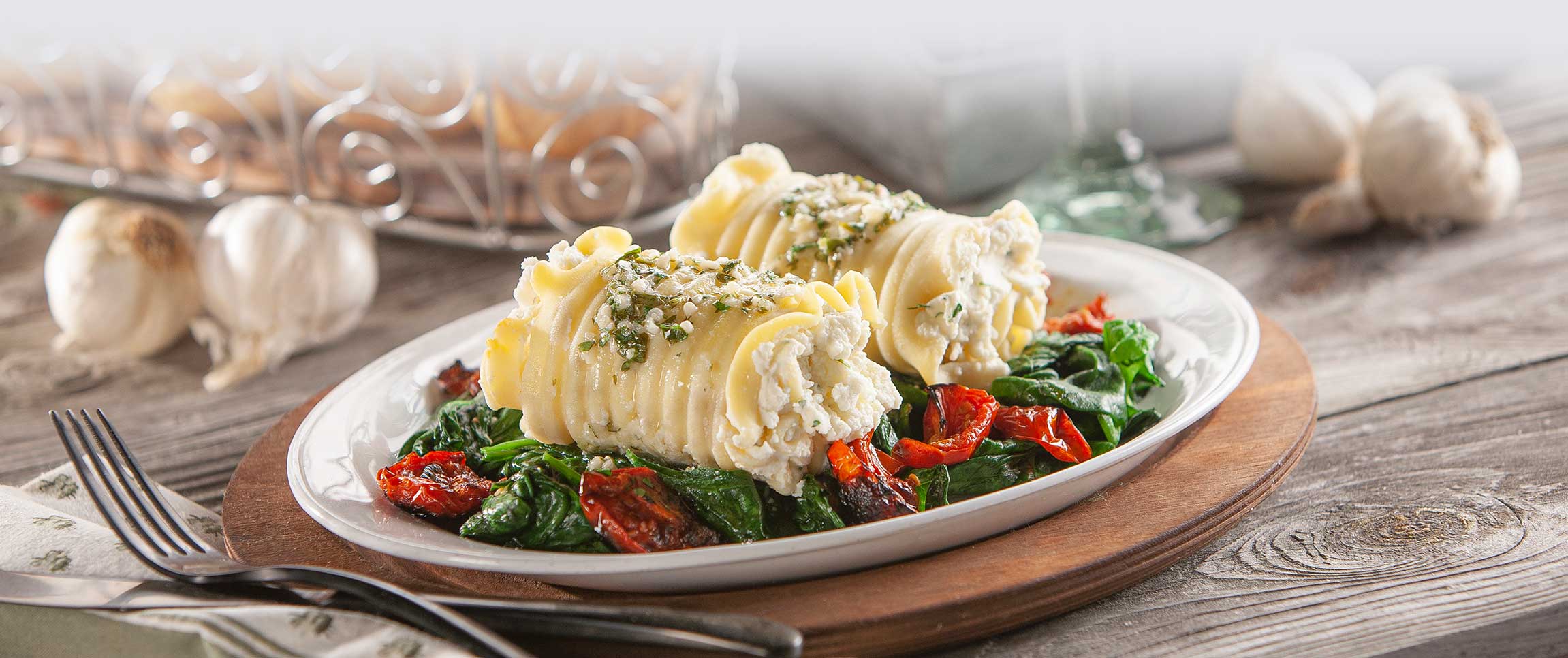 Lasagna Rollettes with Sauteed Spinach and Roasted Tomatoes