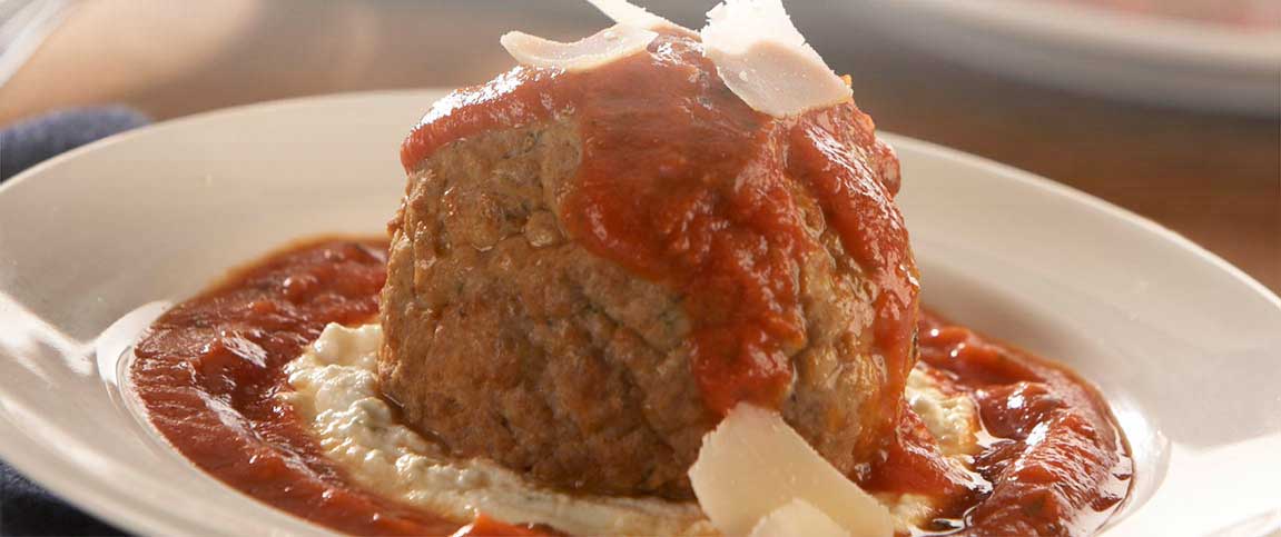 Meatballs Topped with Ricotta Cheese and Marinara Sauce