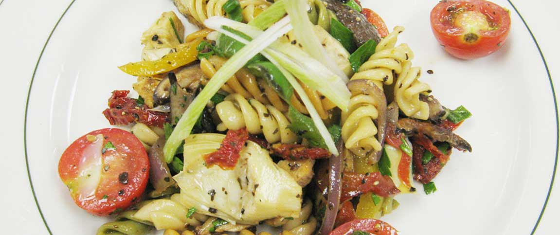 Meat and Vegetable Medley Over Rotini Pasta