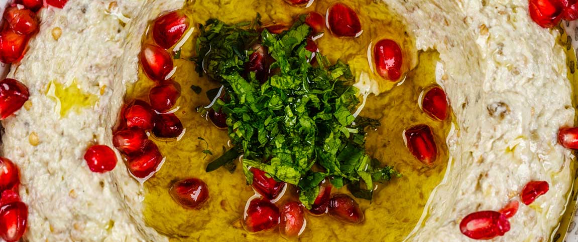 Pomegranate Cherry and Almond Topped Hummus