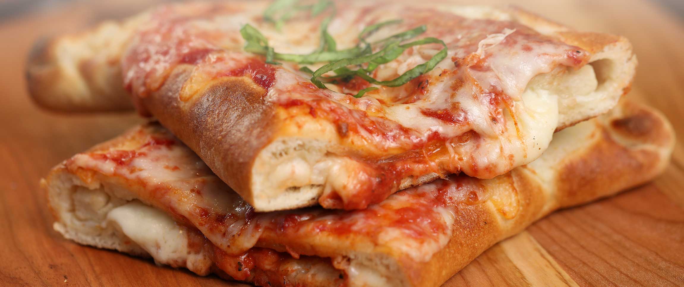 pizza dough stuffed with Bacio cheese, garlic chili oil, and basil.