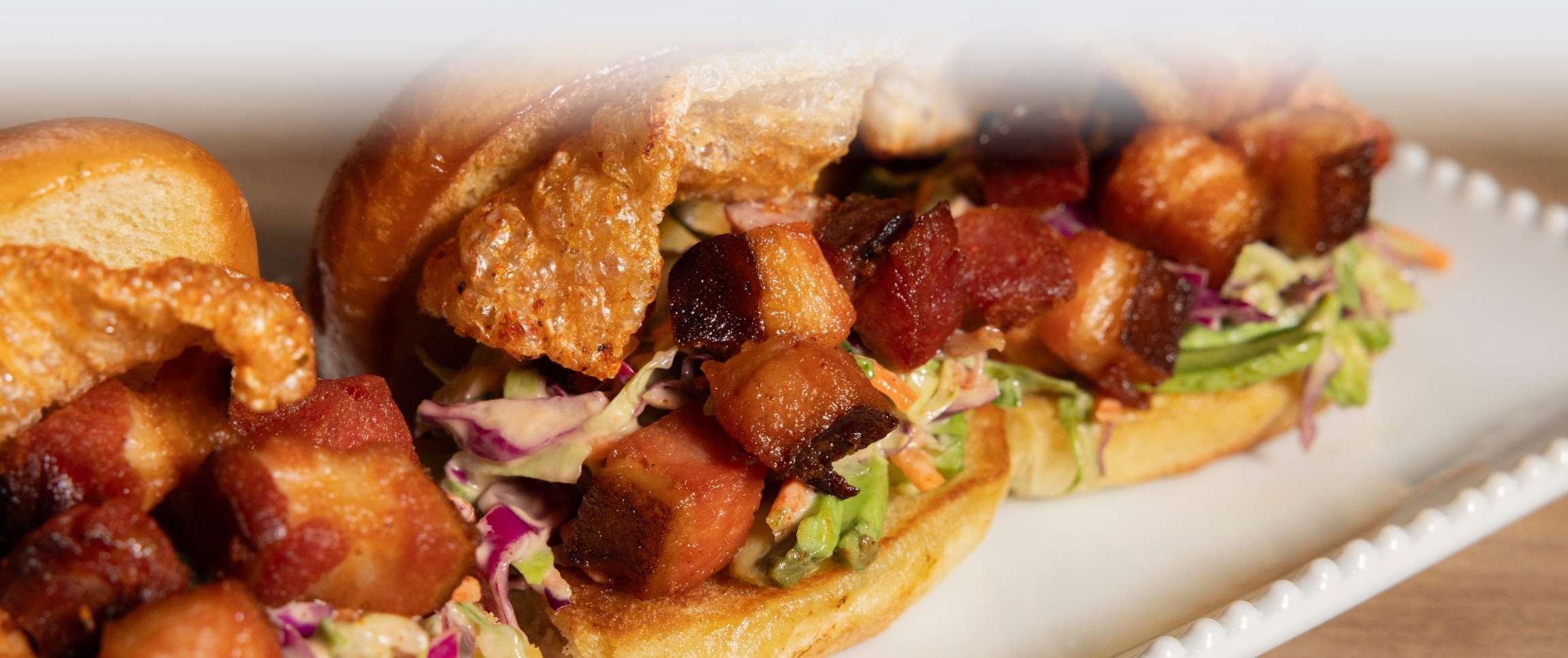 Pork Belly Sliders with Mango Habanero Salsa, Queso Fresco and Pickle Red Onions