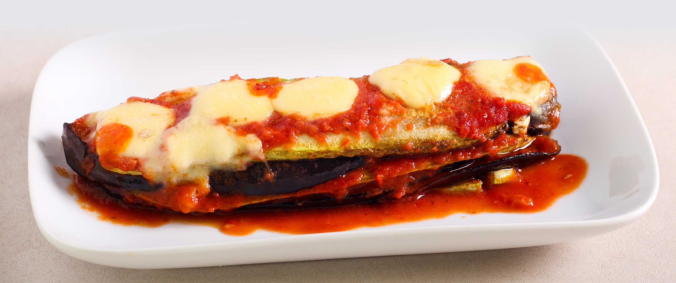 Roasted Eggplant and Zucchini Lasagna with Bacio Cheese
