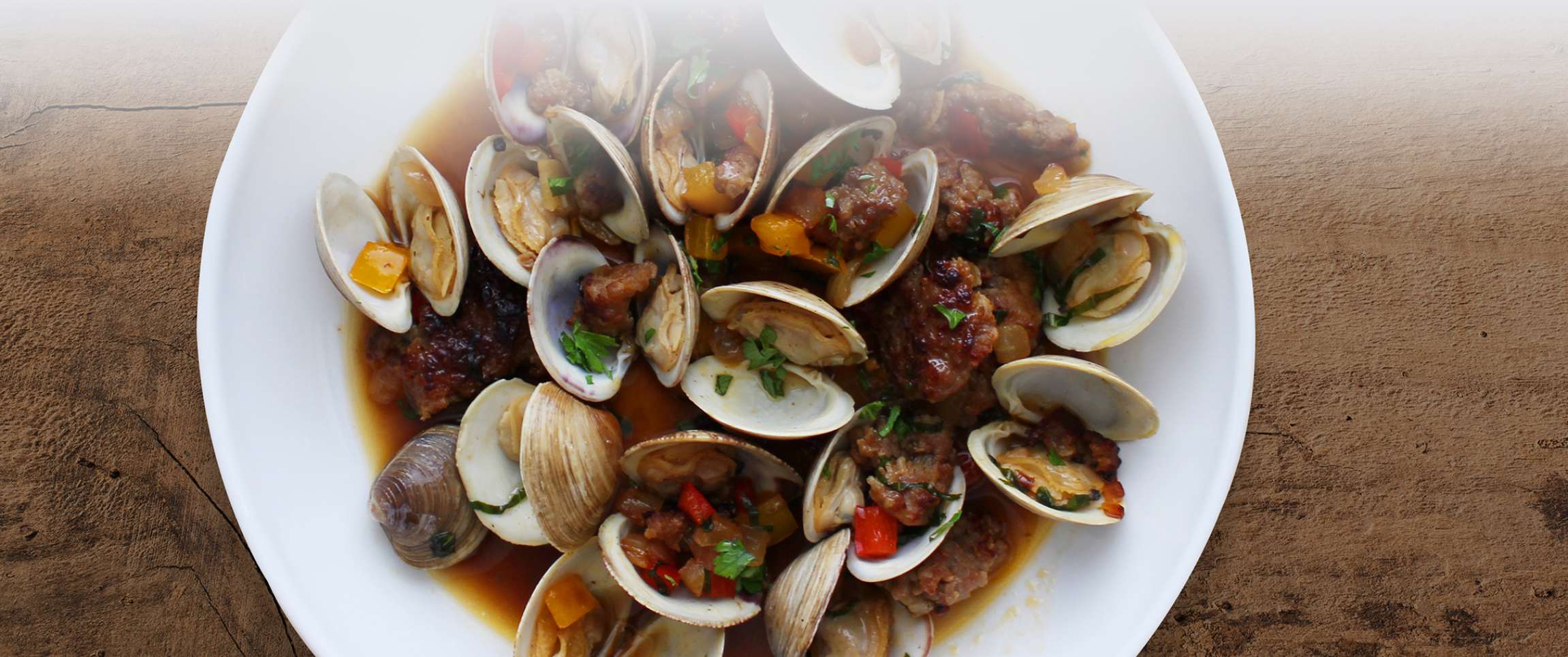Clams with Spicy Italian Sausage and Peppers
