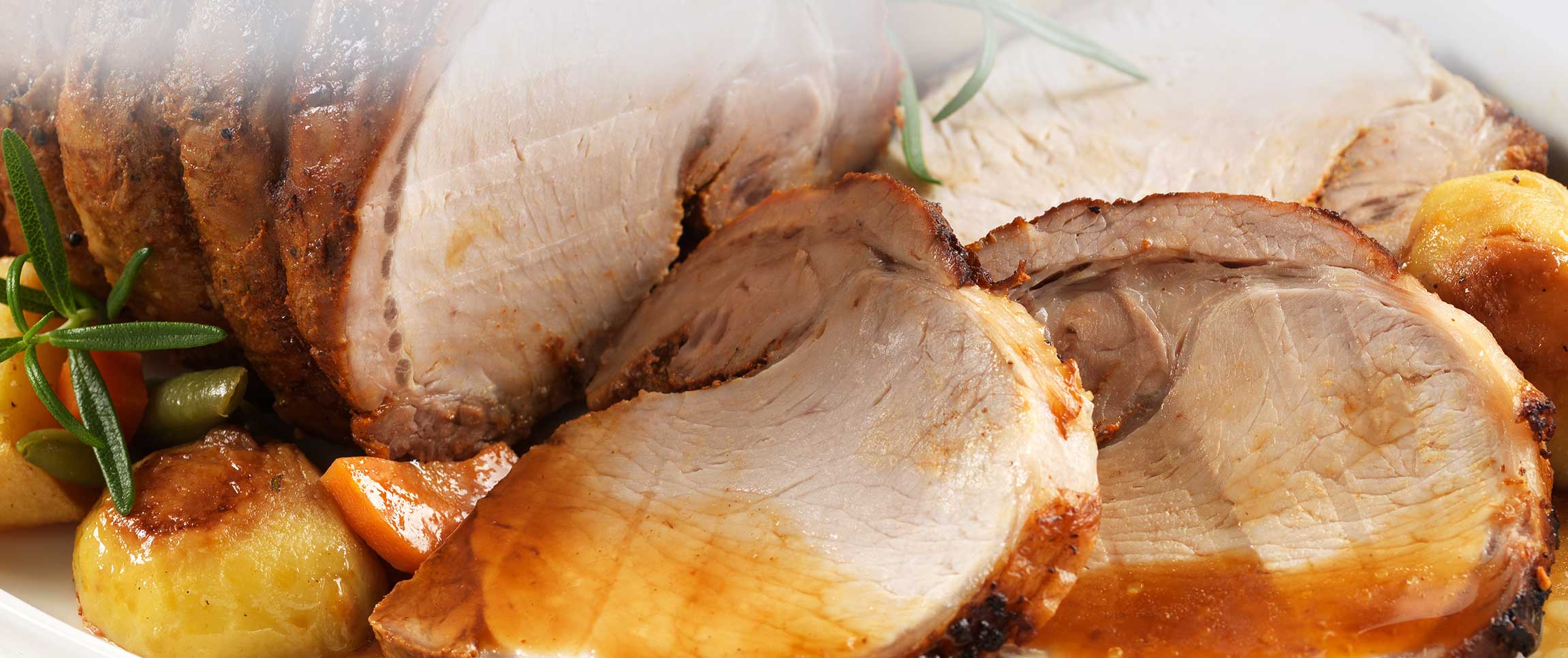 pork tenderloin topped with a sweet and spicy chipotle pepper and pineapple glaze