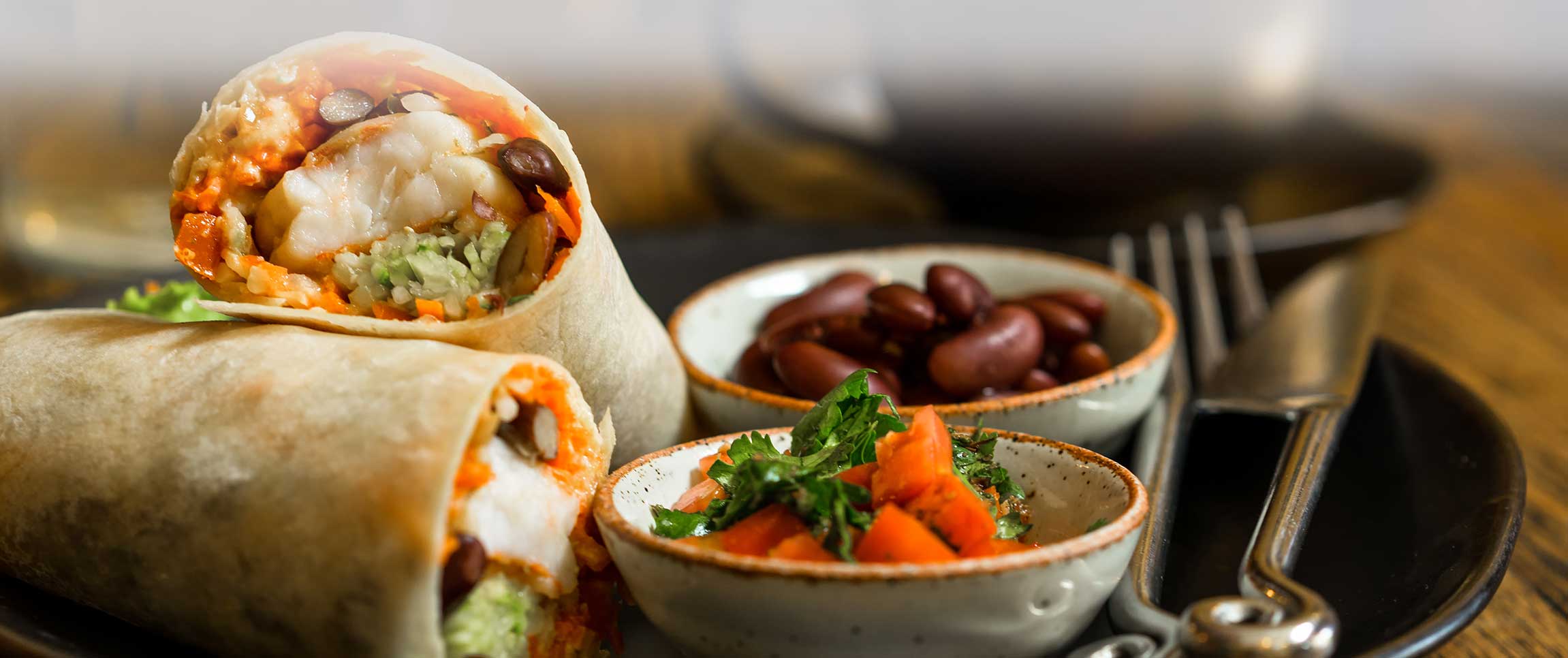 Flour tortilla filled with blackened shrimp, Hispanic rice, jicama slaw and a chipotle aioli