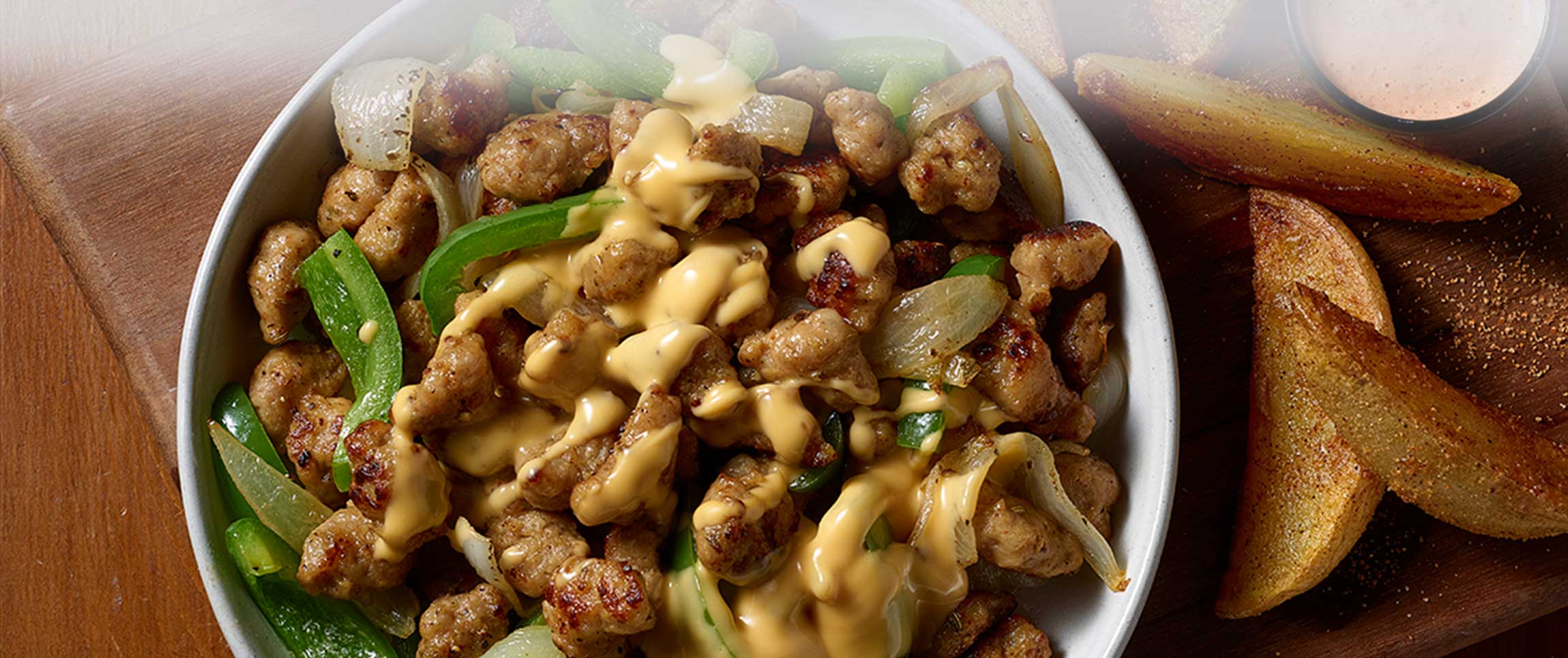 Sausage, Onion, Pepper, and Cheese Bowl