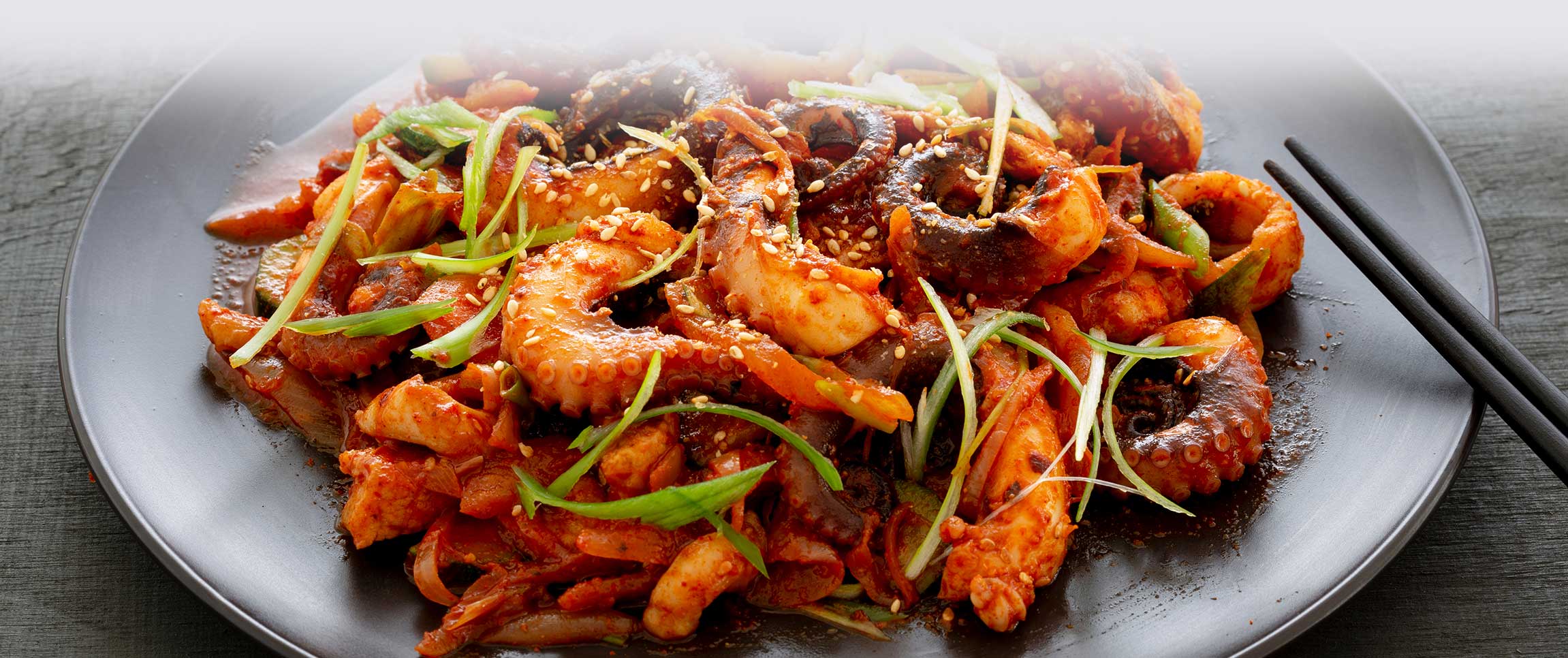 Assoluti® Charred Calamari with Pipérade and Lemony Chickpeas