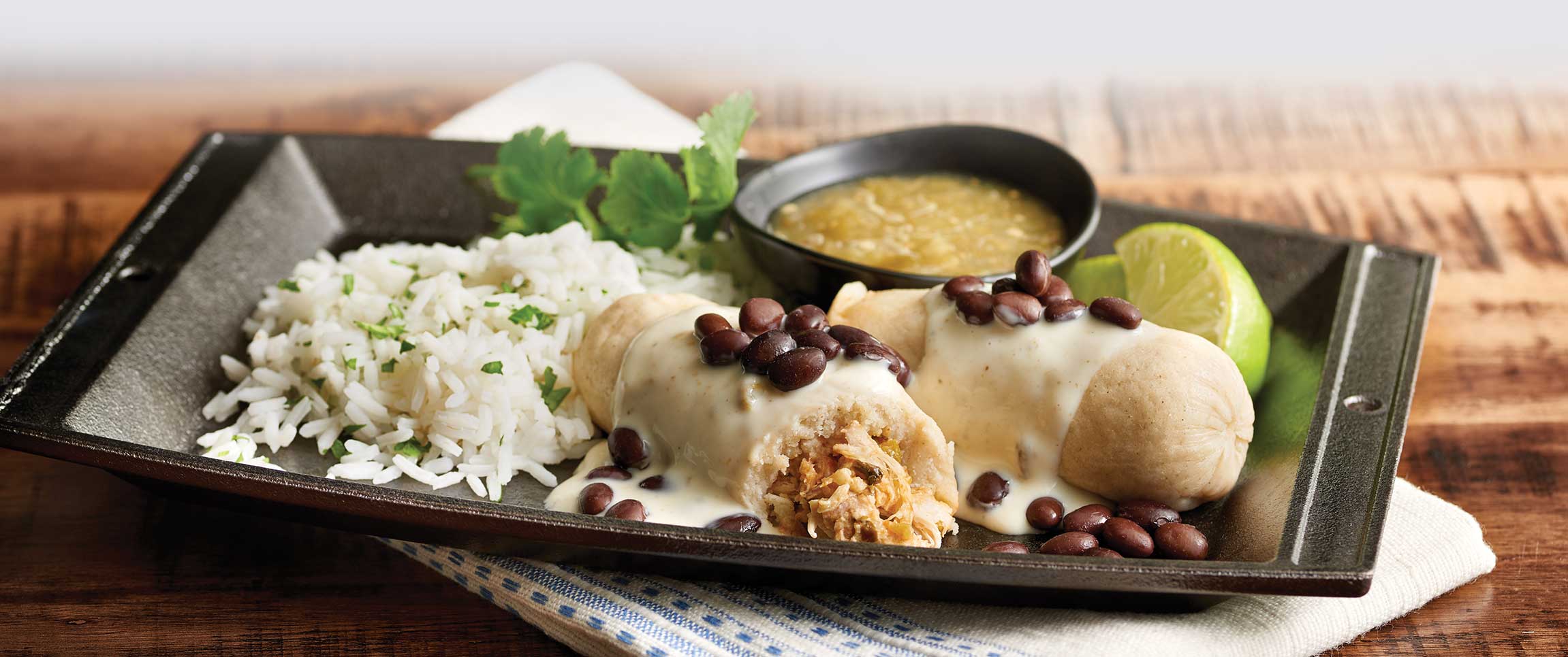 Cheddar Cheese Chicken Tamales with Roasted Poblano Sauce
