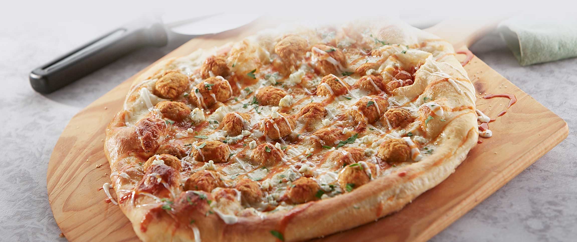 Buffalo Style Chicken Meatball Pizza