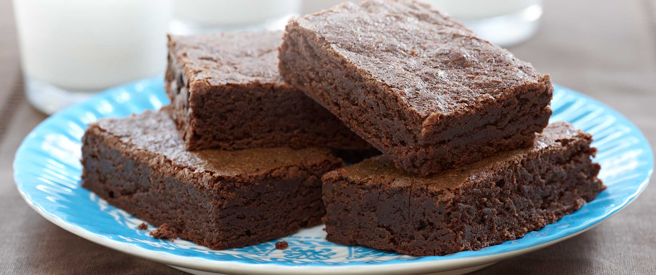 Cinnamon Fudge Brownies on a blue plate