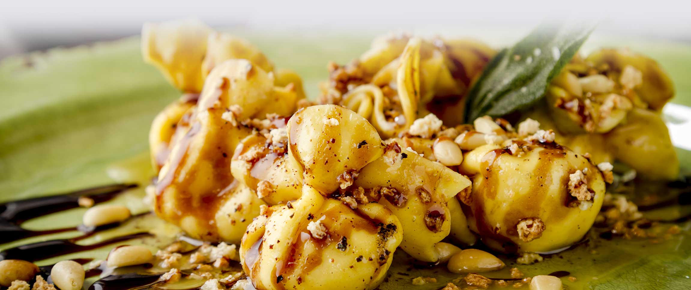 Piancone Epicurio Gorgonzola-Pear Sacchetti with Maple Cream and Crispy Pancetta