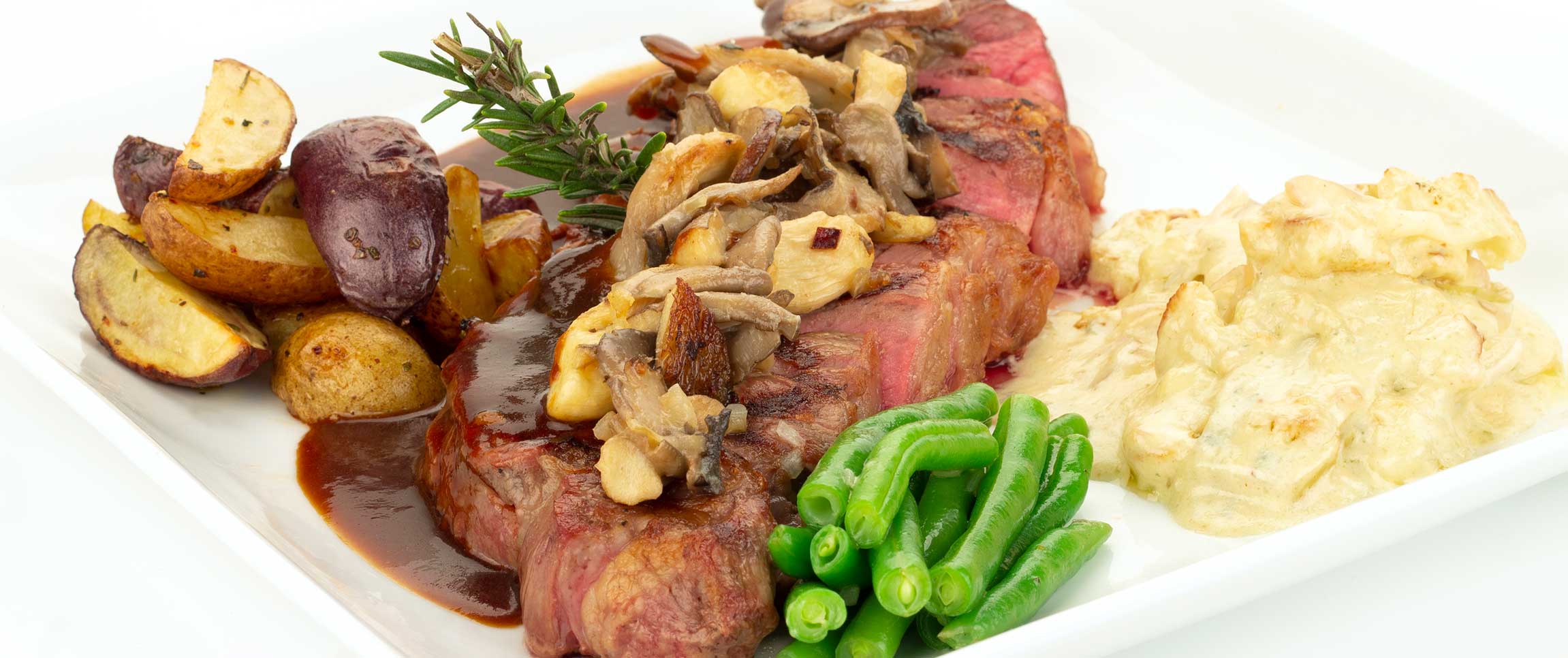Grilled New York Strip Topped with a Wild Mushroom Mix